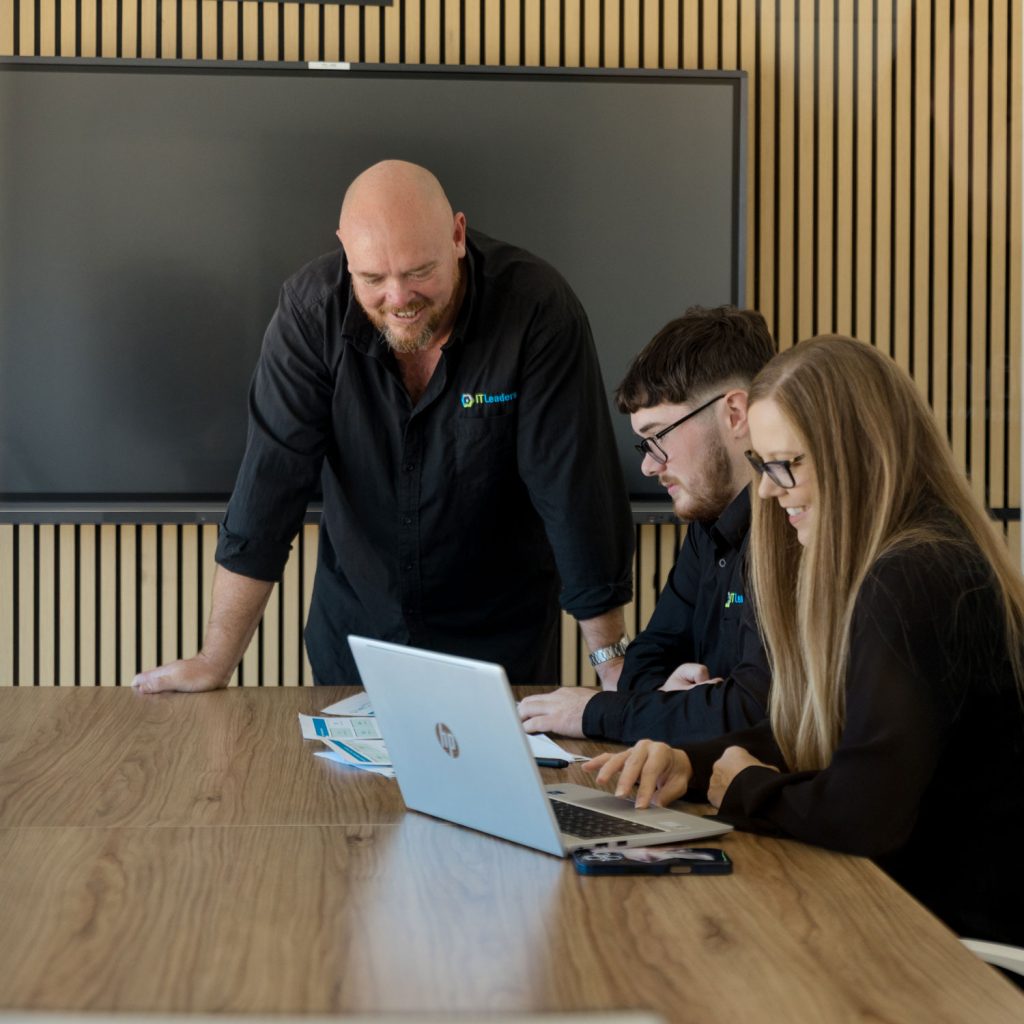 IT Leaders director and operations manager with a service technician.